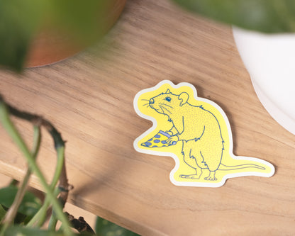 Thiskind illustrated collectible vinyl sticker. NYC Subway favorite Pizza Rat. Yellow
